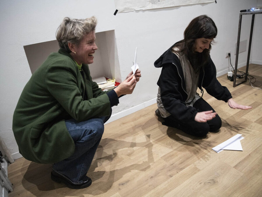 Folding paper boats for Arthur Cravan at the opening of The Boxing Gallery, under the auspices of the Fondazione Arthur Cravan, Nov. 3, 2024. Photo: Filippo Romano