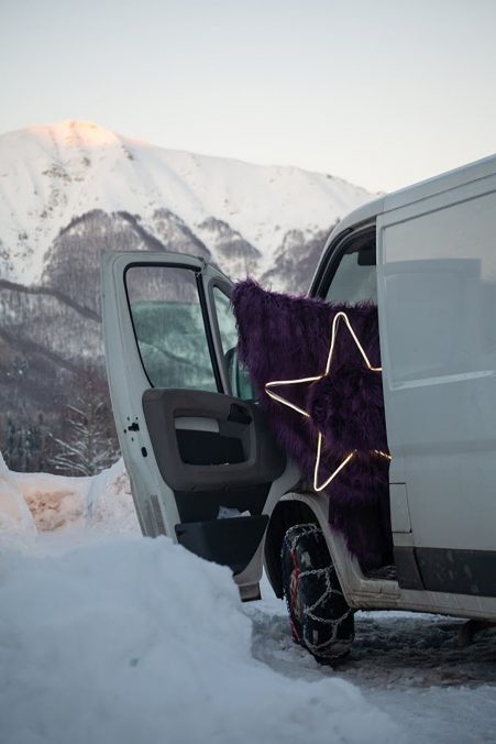 The Polka van chained for the snow with an installation by Giulia Poppi