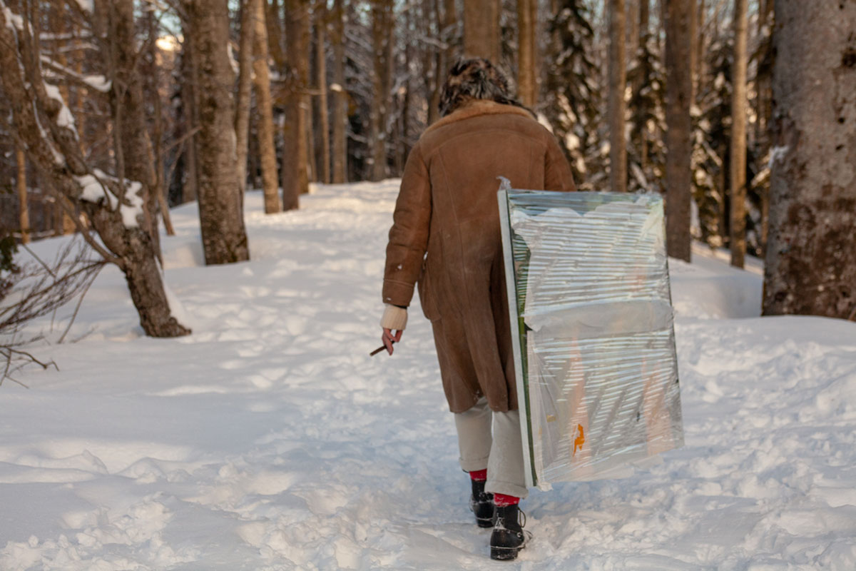 Luigi Presicce installing a piece by Francesco Lauretta into the woods in Abetone (Pistoia) during the second Polka